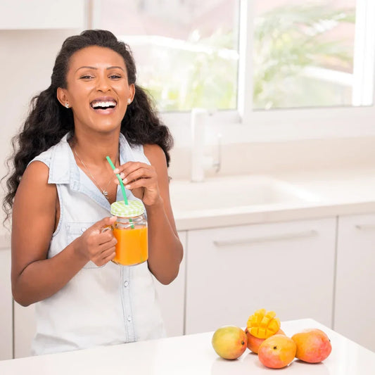 Why do some people feel more energized after drinking mango smoothies?